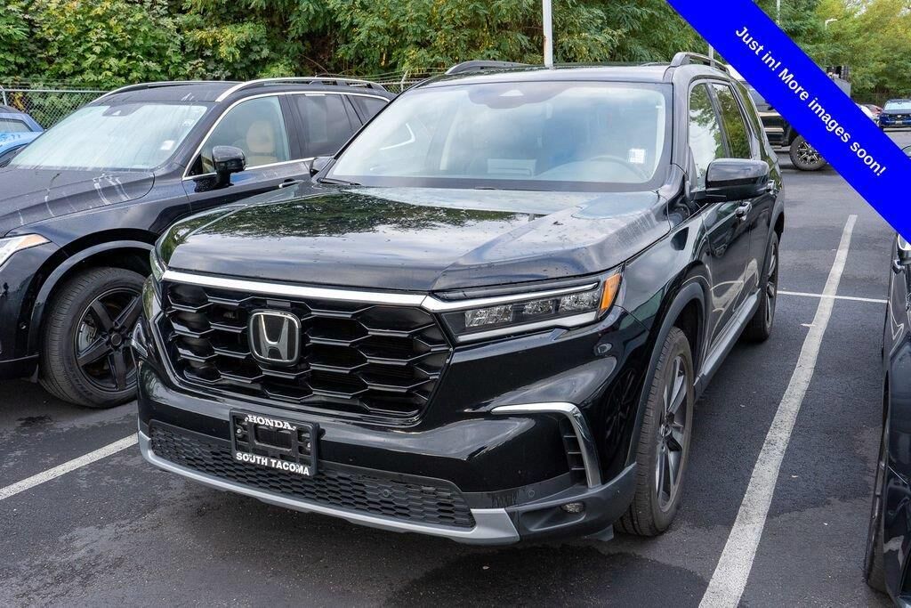 2024 Honda Pilot Touring — photo 1 of 4