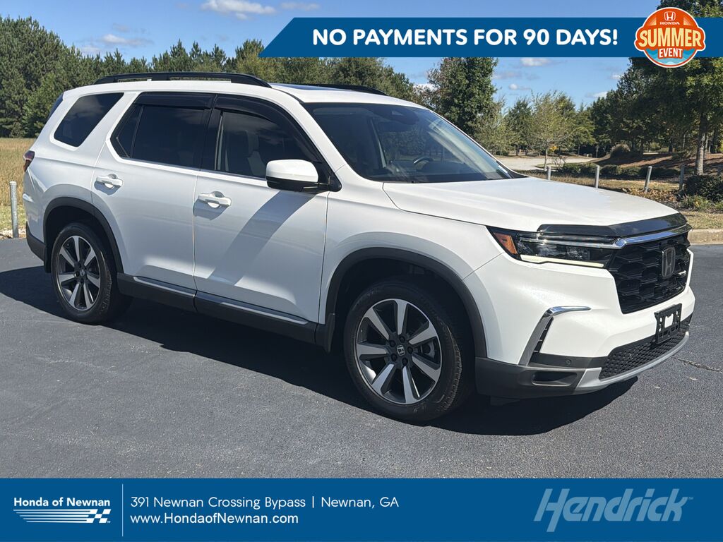 2025 Honda Pilot AWD Touring — photo 1 of 7