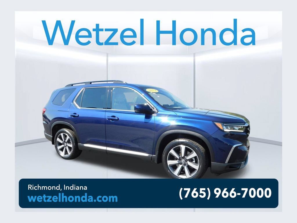 2024 Honda Pilot AWD TRG — photo 1 of 7