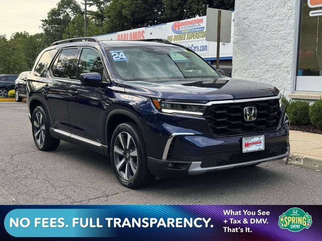 2024 Honda Pilot AWD TRG — photo 1 of 7