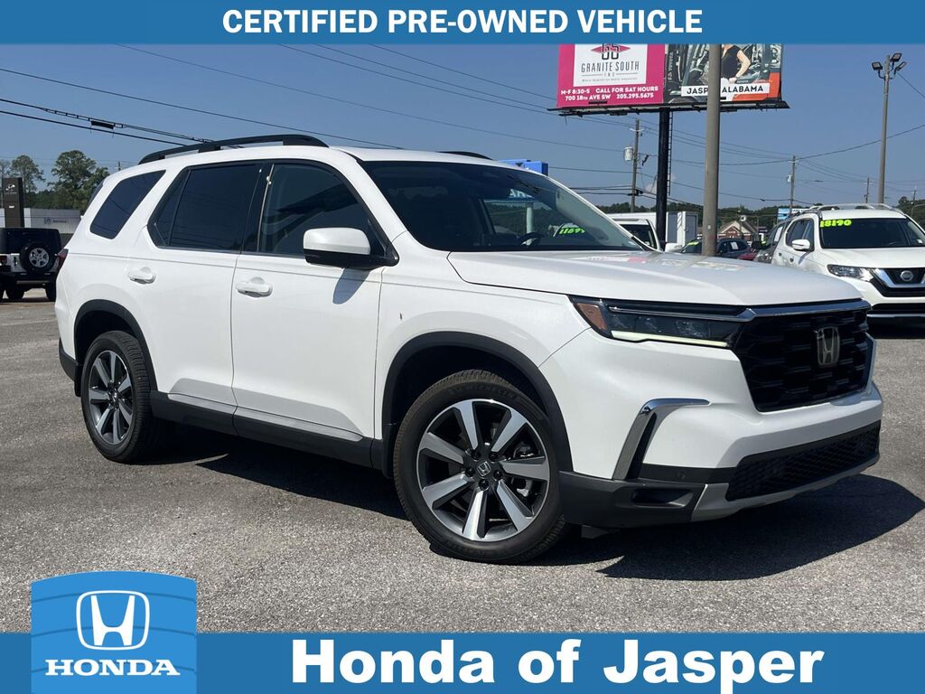 2025 Honda Pilot Touring AWD — photo 1 of 13