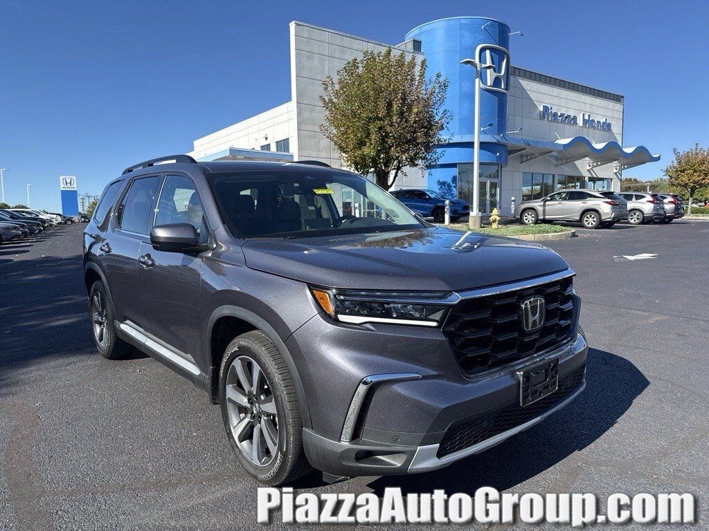 2024 Honda Pilot AWD TRG — photo 1 of 7
