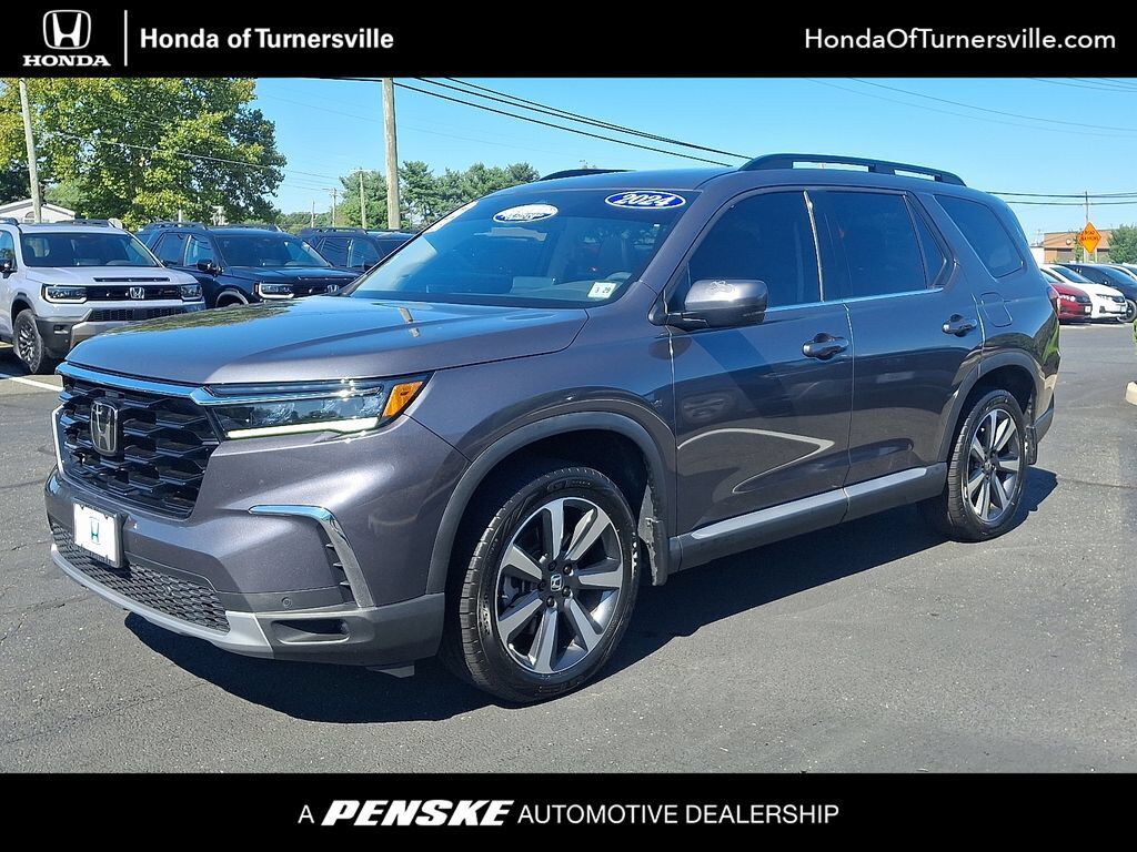 2024 Honda Pilot AWD TRG — photo 1 of 7