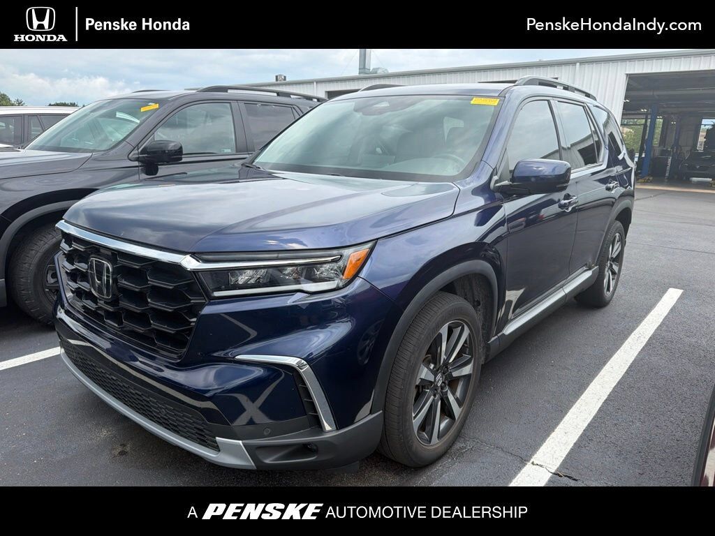 2024 Honda Pilot AWD TRG — photo 1 of 7