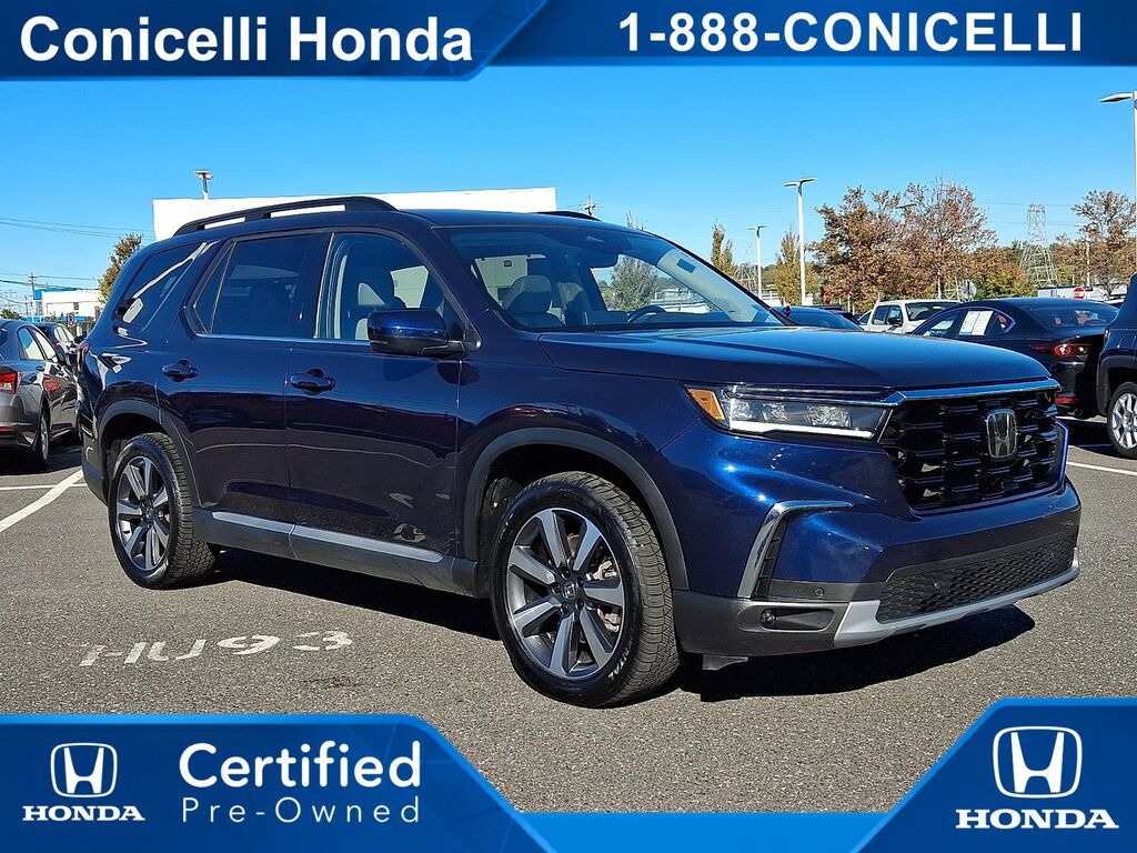 2025 Honda Pilot AWD TRG — photo 1 of 7