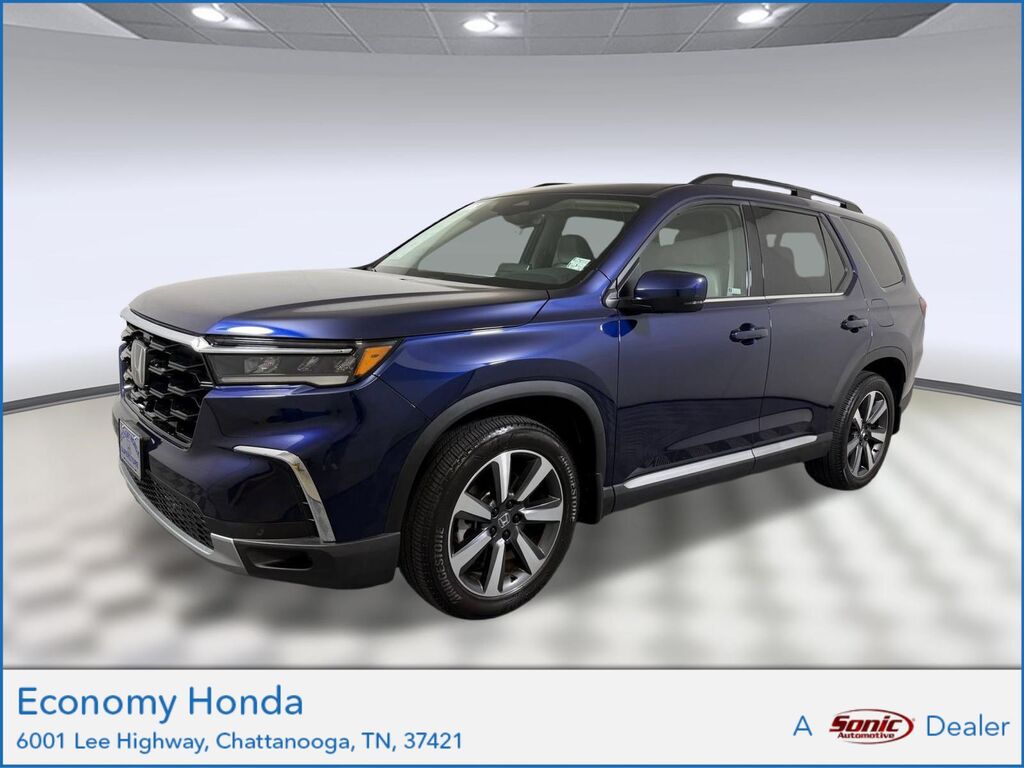 2024 Honda Pilot AWD TRG — photo 1 of 7