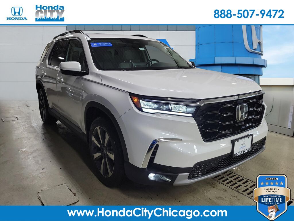 2025 Honda Pilot Touring — photo 1 of 7