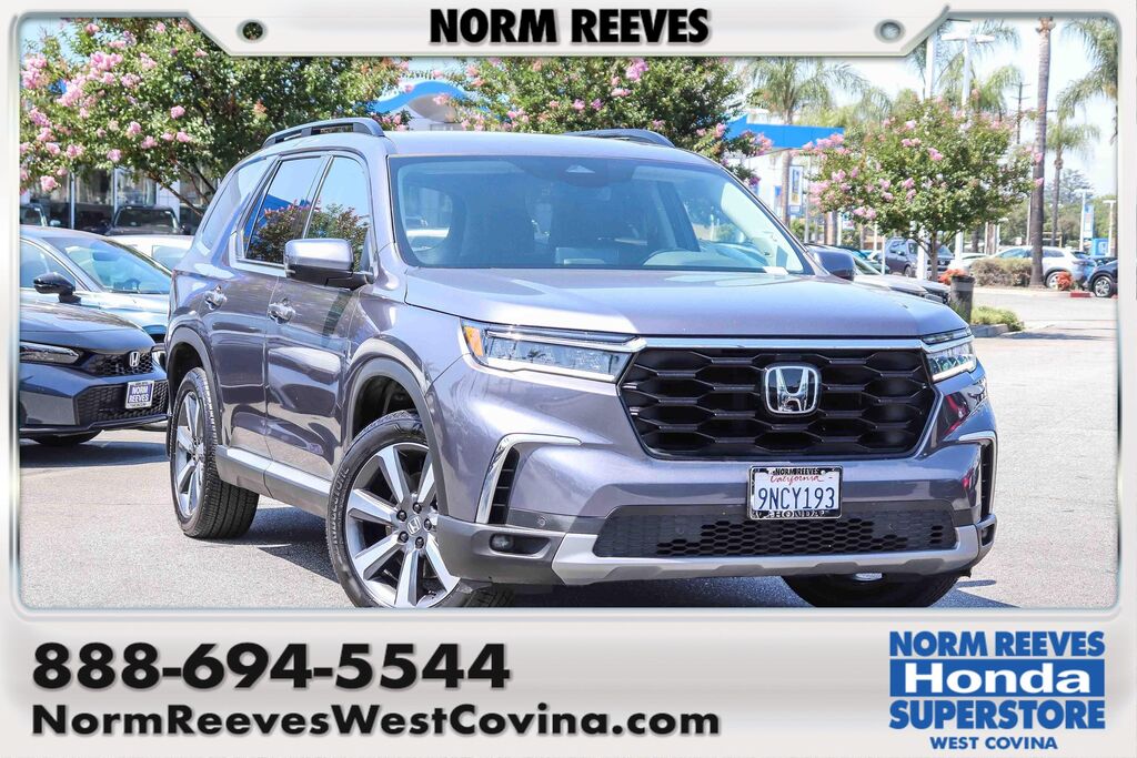 2025 Honda Pilot Touring — photo 1 of 20