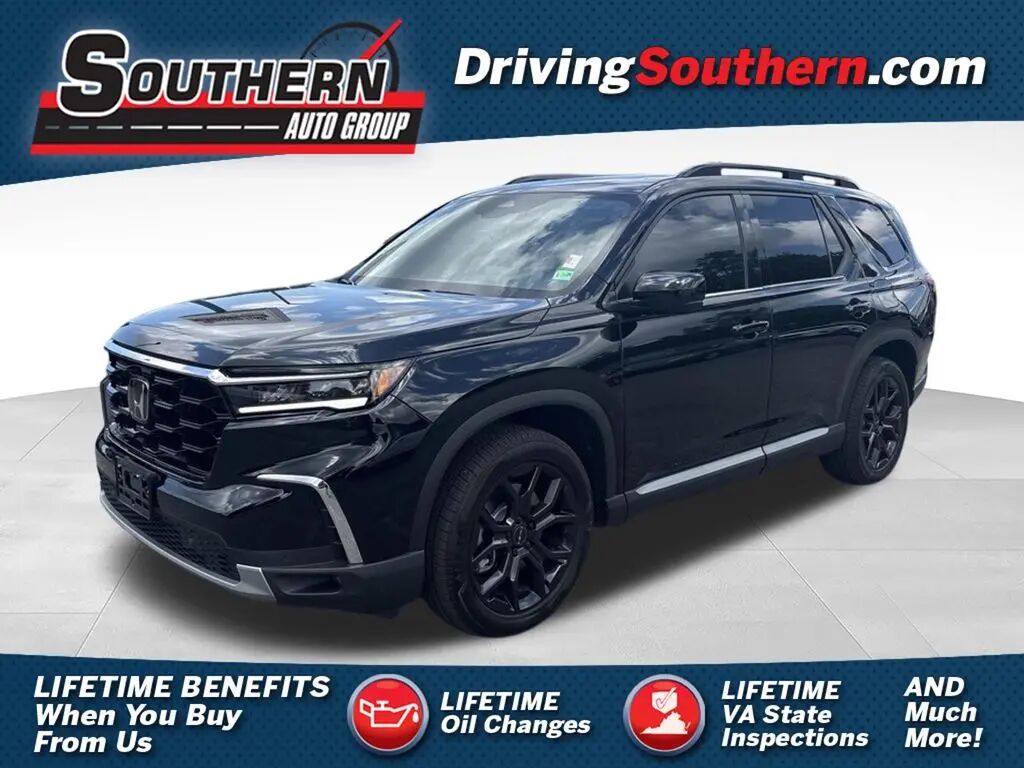 2025 Honda Pilot Touring — photo 1 of 14