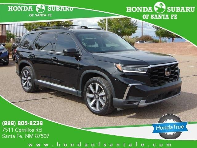 2024 Honda Pilot Touring — photo 1 of 7