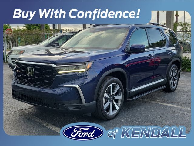 2024 Honda Pilot Touring — photo 1 of 13