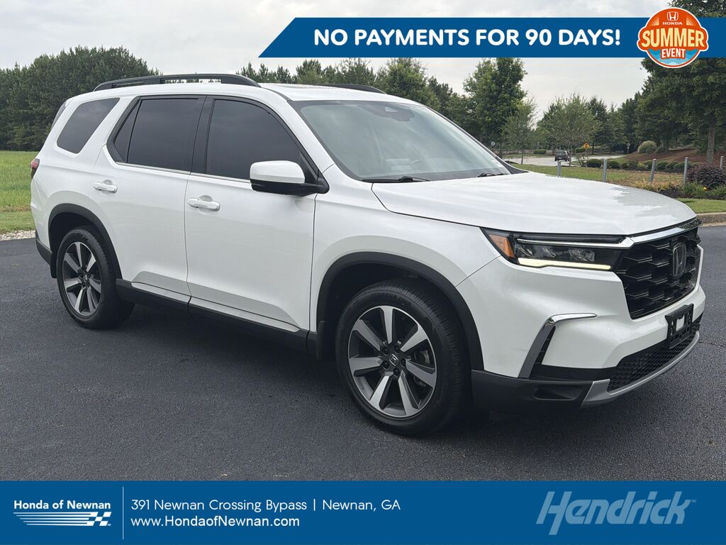 2024 Honda Pilot Touring — photo 1 of 13