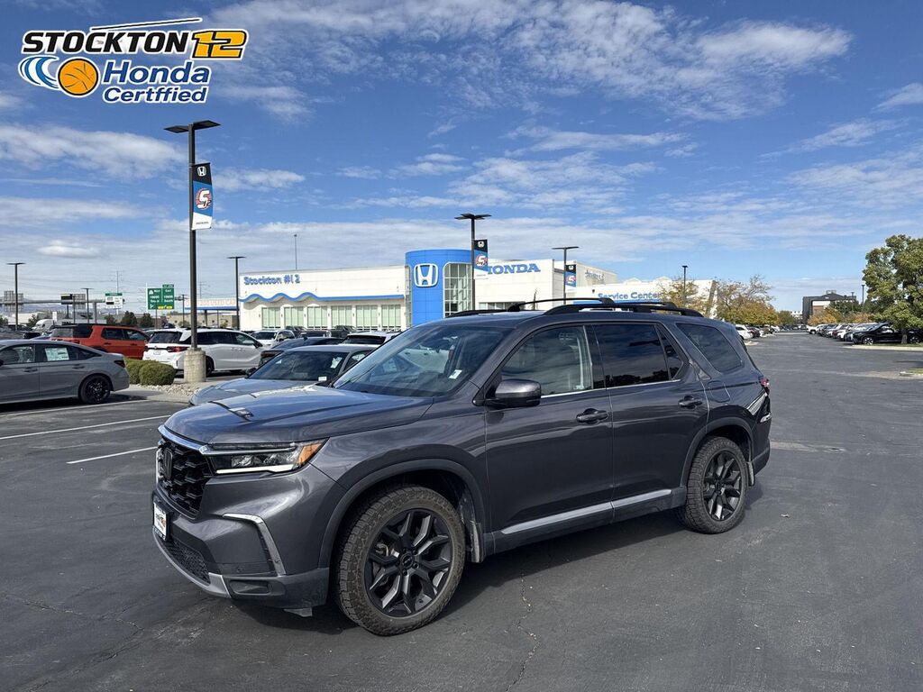 2024 Honda Pilot AWD TRG — photo 1 of 7