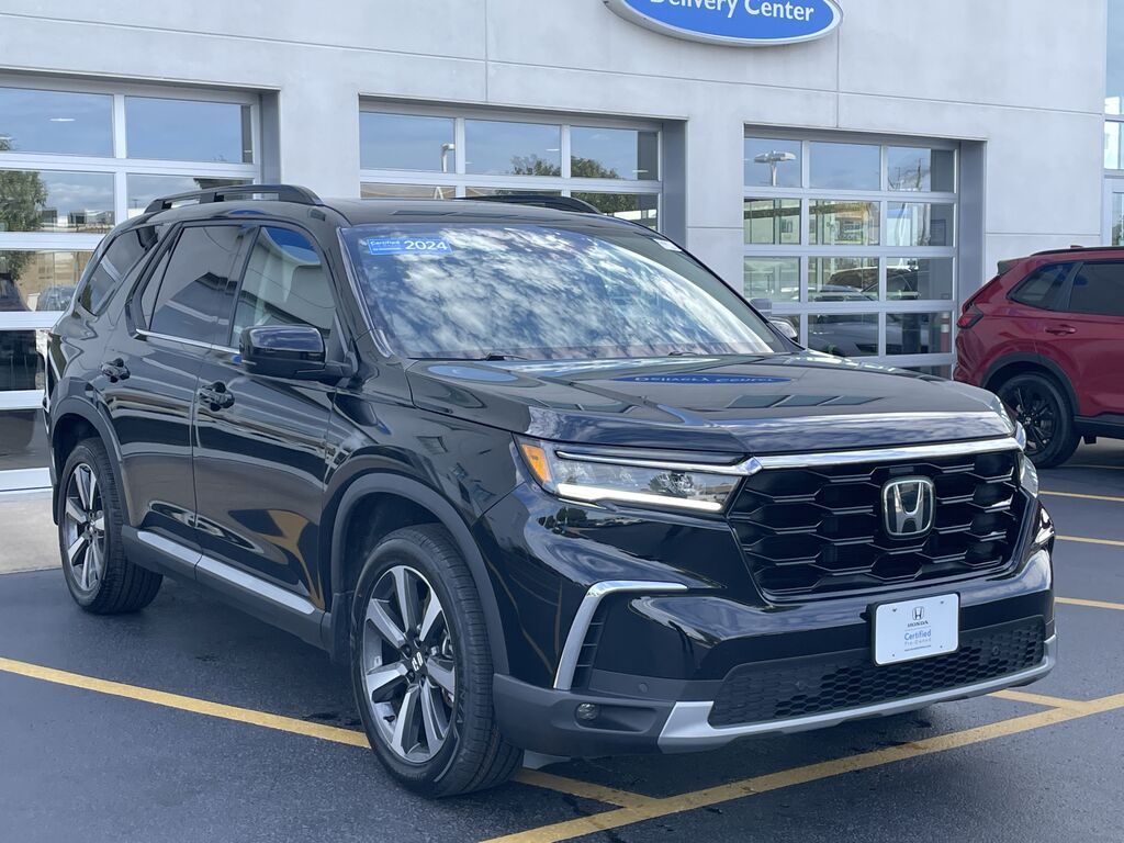 2024 Honda Pilot AWD TRG — photo 1 of 7