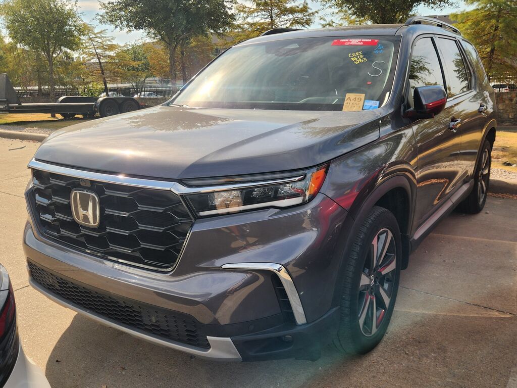 2023 Honda Pilot AWD ELITE — photo 1 of 7