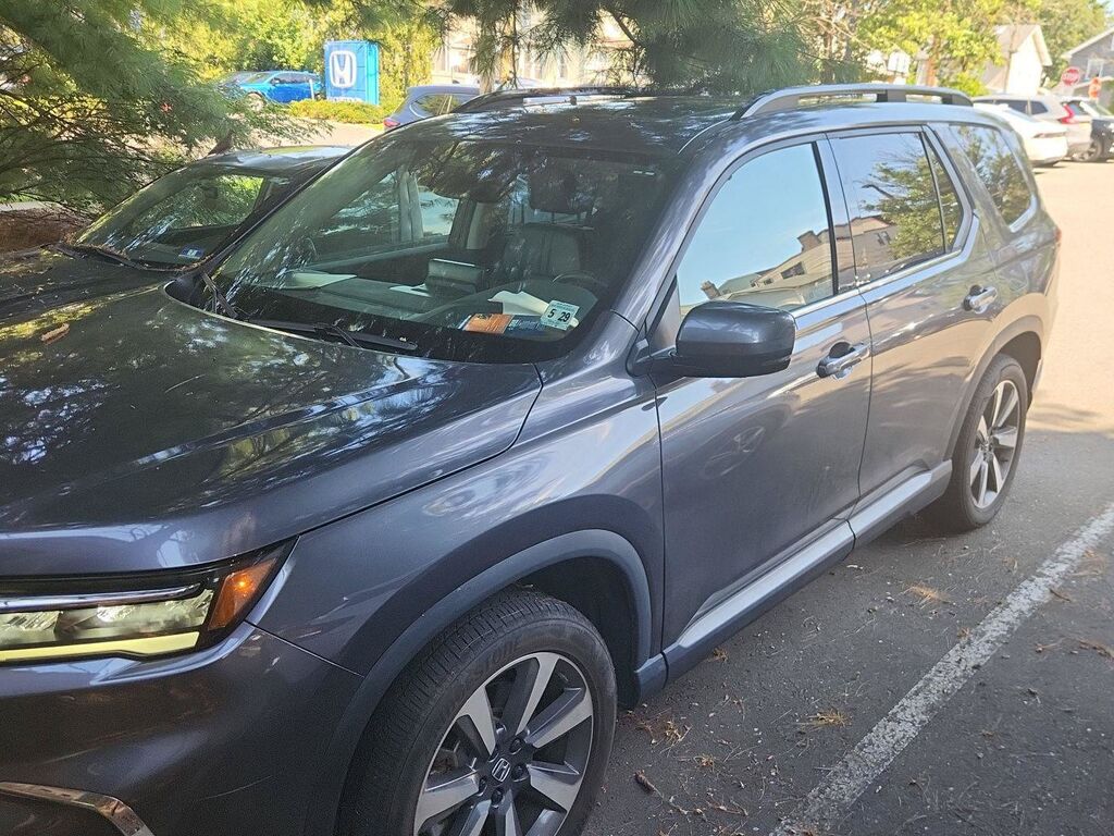 2024 Honda Pilot AWD ELITE — photo 1 of 7
