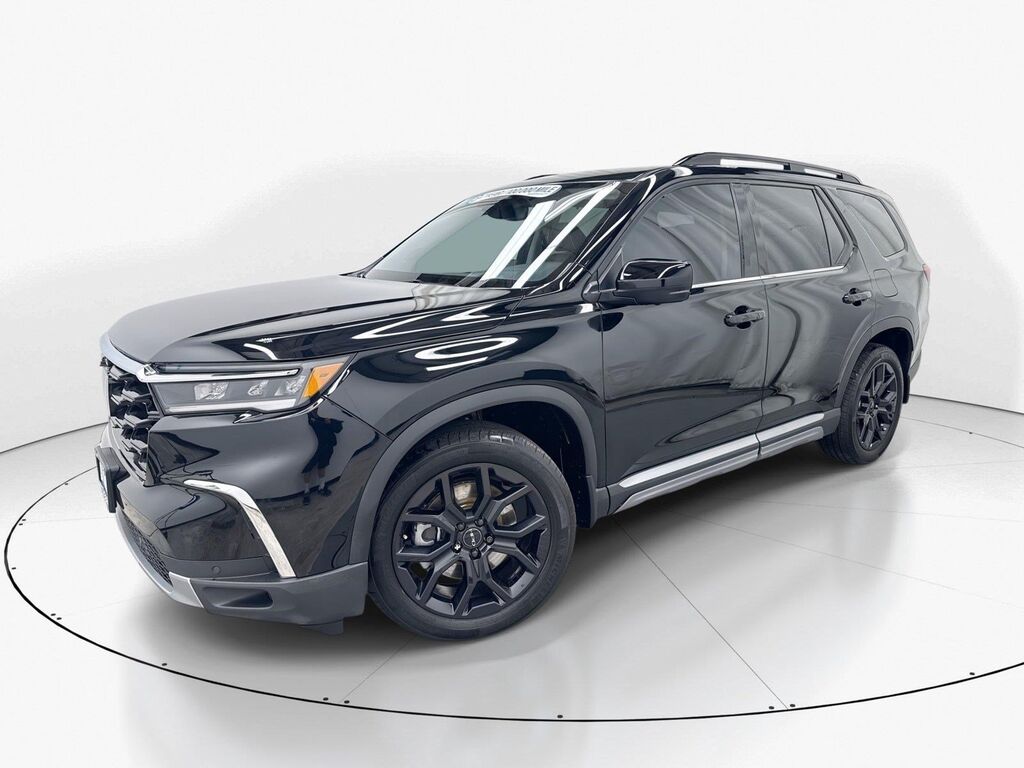 2025 Honda Pilot AWD Elite — photo 1 of 7