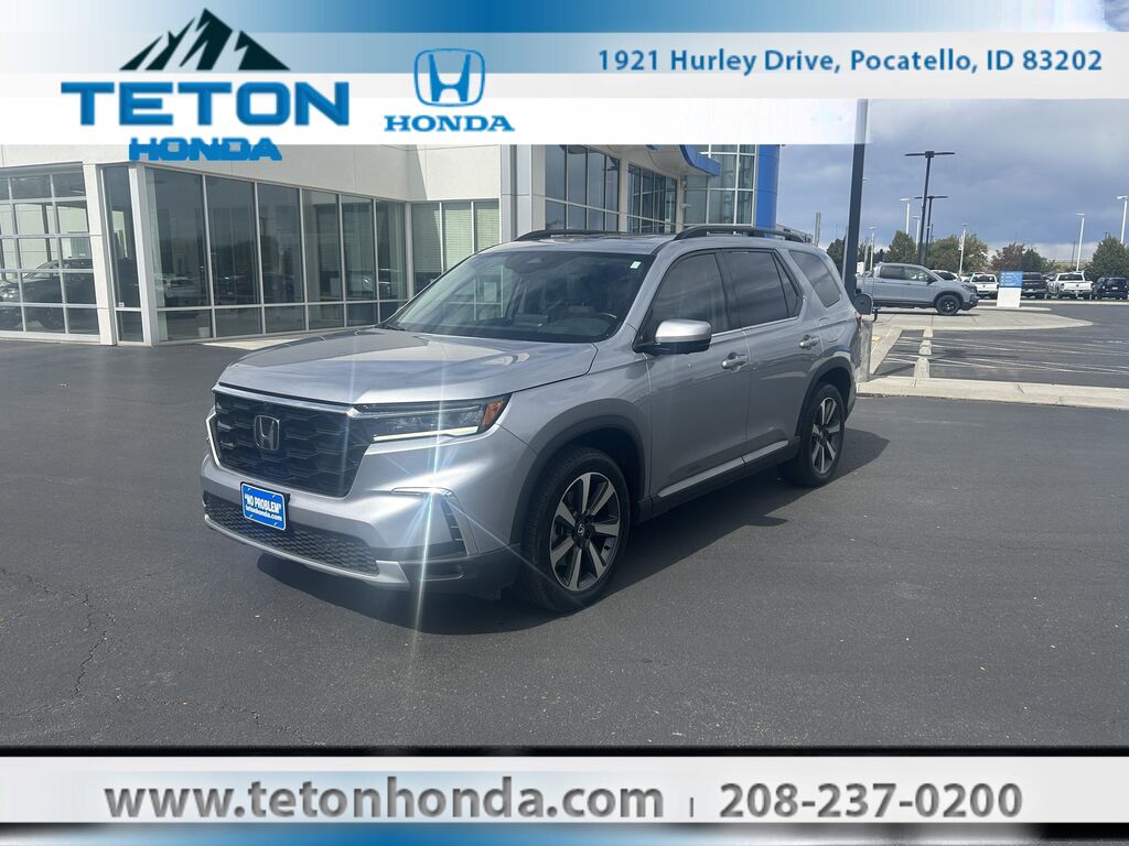 2023 Honda Pilot AWD ELITE — photo 1 of 7