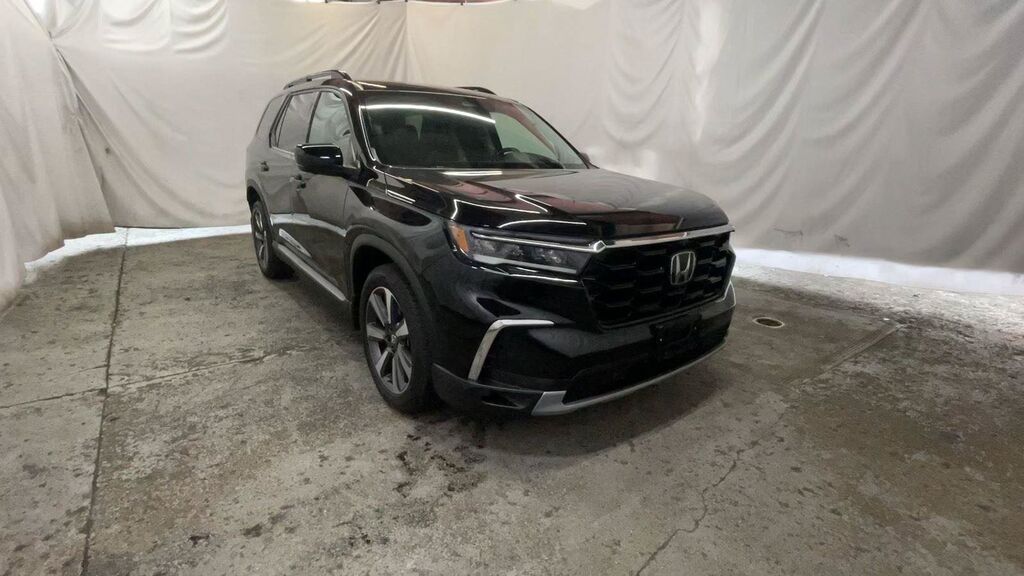 2025 Honda Pilot AWD Elite — photo 1 of 7
