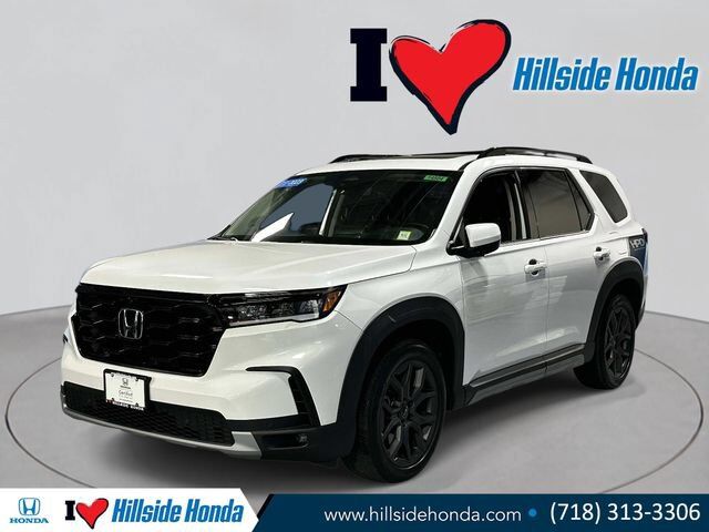 2023 Honda Pilot AWD ELITE — photo 1 of 7