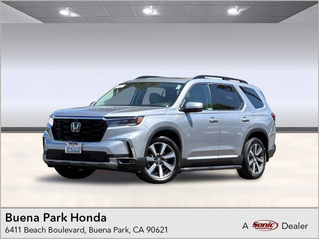 2023 Honda Pilot AWD ELITE — photo 1 of 7