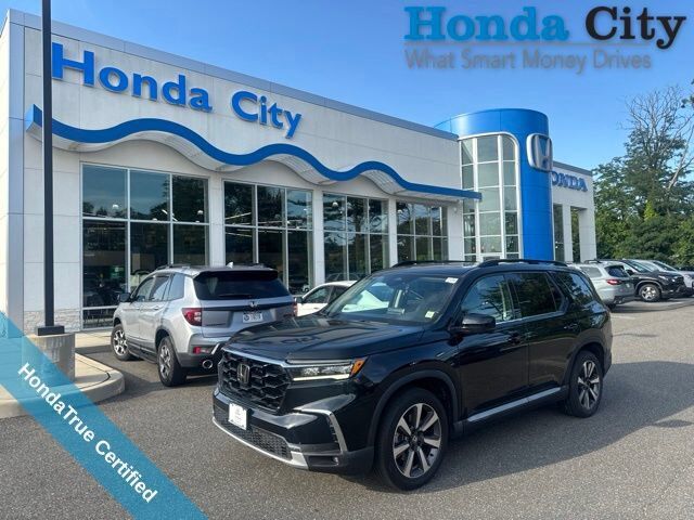 2023 Honda Pilot AWD ELITE — photo 1 of 7
