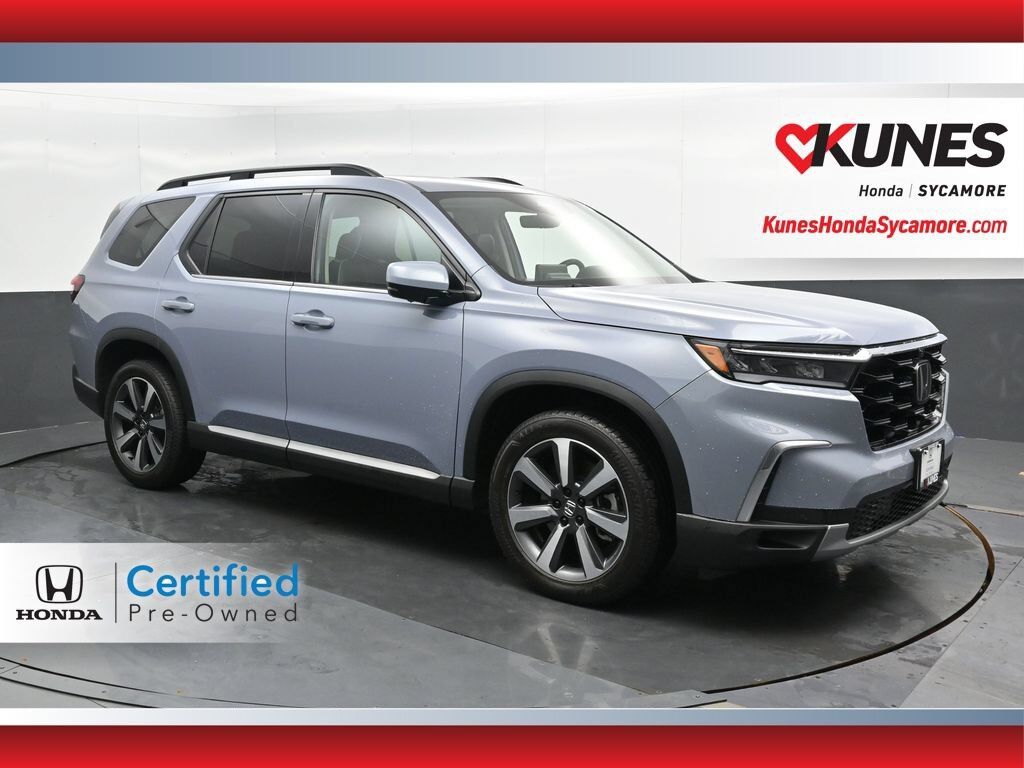 2023 Honda Pilot AWD ELITE — photo 1 of 7