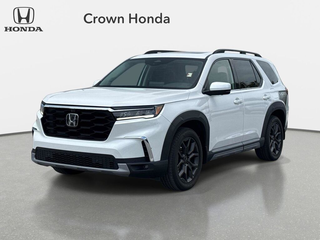 2023 Honda Pilot AWD ELITE — photo 1 of 7