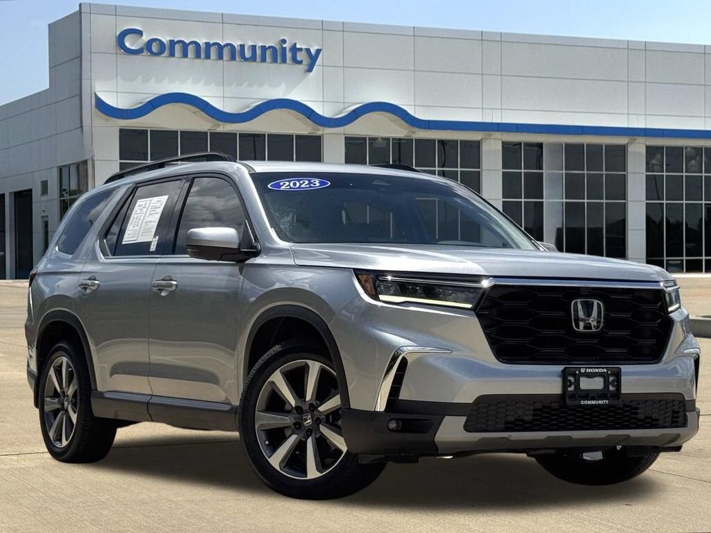 2023 Honda Pilot AWD ELITE — photo 1 of 7