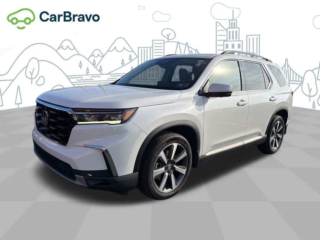 2023 Honda Pilot AWD Elite — photo 1 of 6