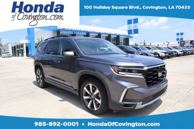 2023 Honda Pilot AWD ELITE — photo 1 of 7