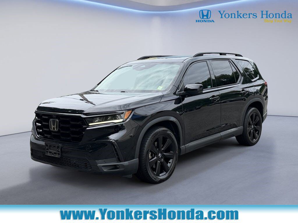 2023 Honda Pilot AWD ELITE — photo 1 of 7