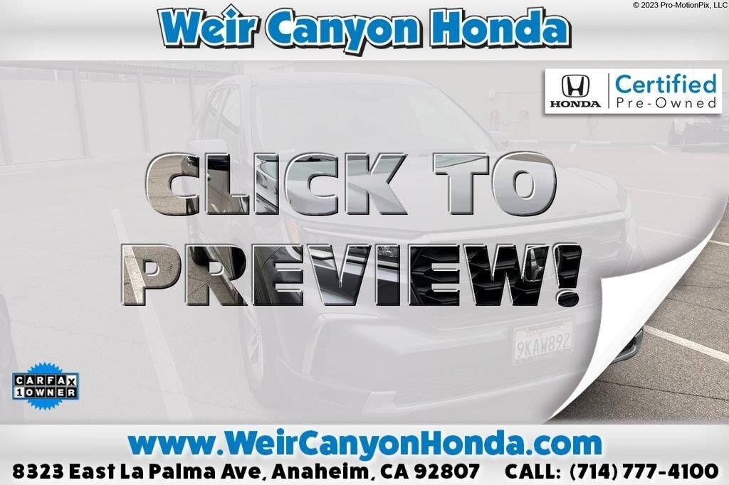 2024 Honda Pilot EX-L w/Rear Captain's Chairs — photo 1 of 11