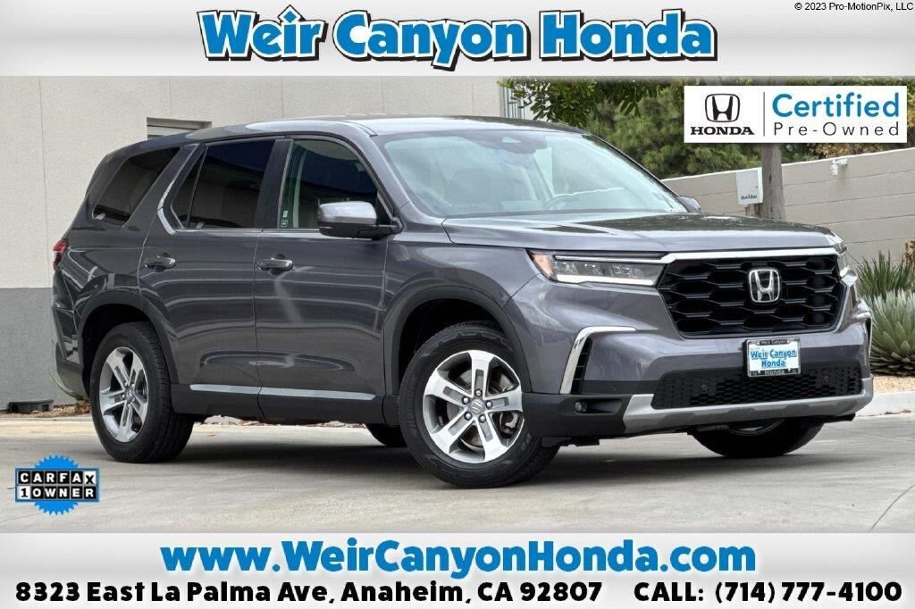 2024 Honda Pilot EX-L w/Rear Captain's Chairs — photo 1 of 13