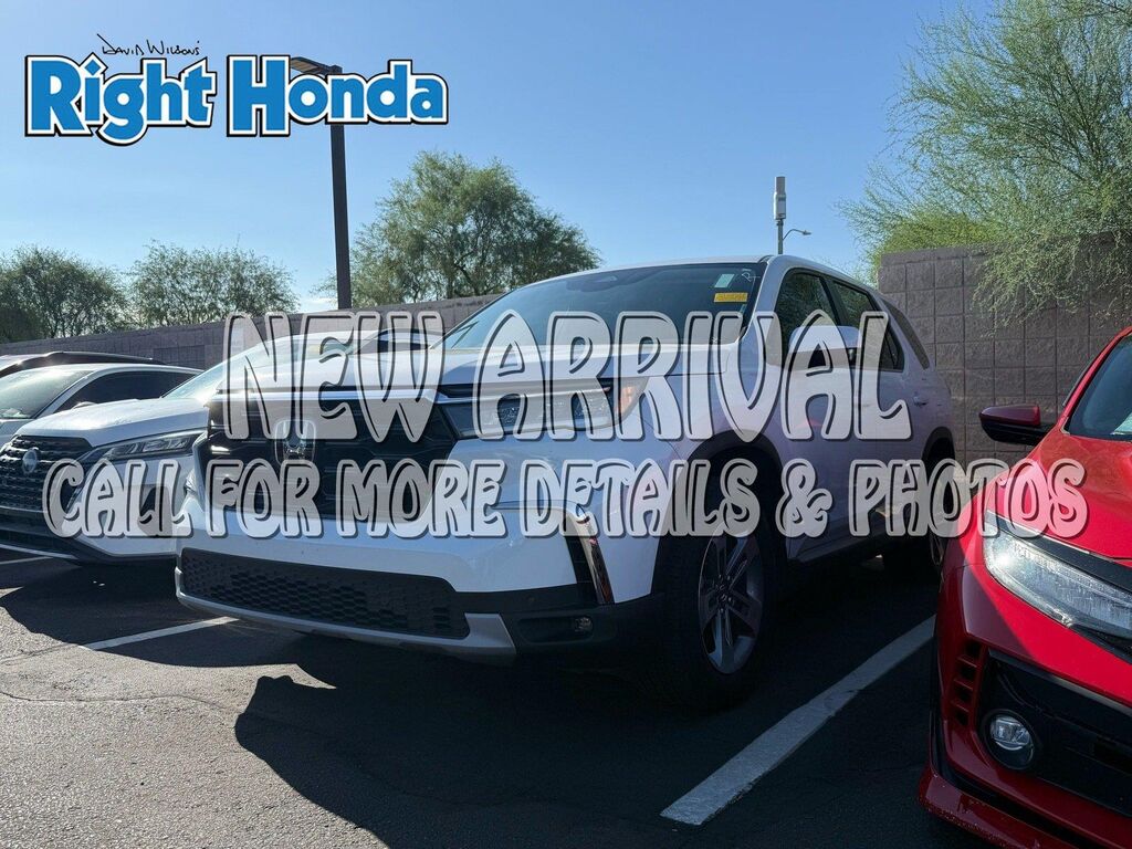 2023 Honda Pilot EX-L w/Rear Captain's Chairs — photo 1 of 13