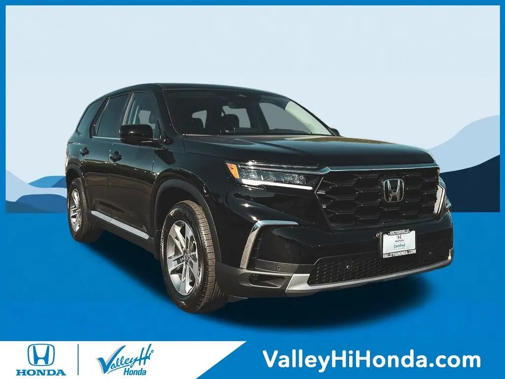 2024 Honda Pilot EX-L w/Rear Captain's Chairs — photo 1 of 11