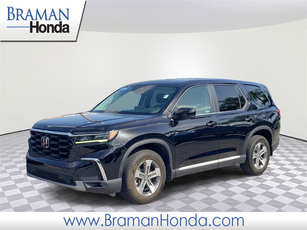 2024 Honda Pilot EX-L w/Rear Captain's Chairs — photo 1 of 13