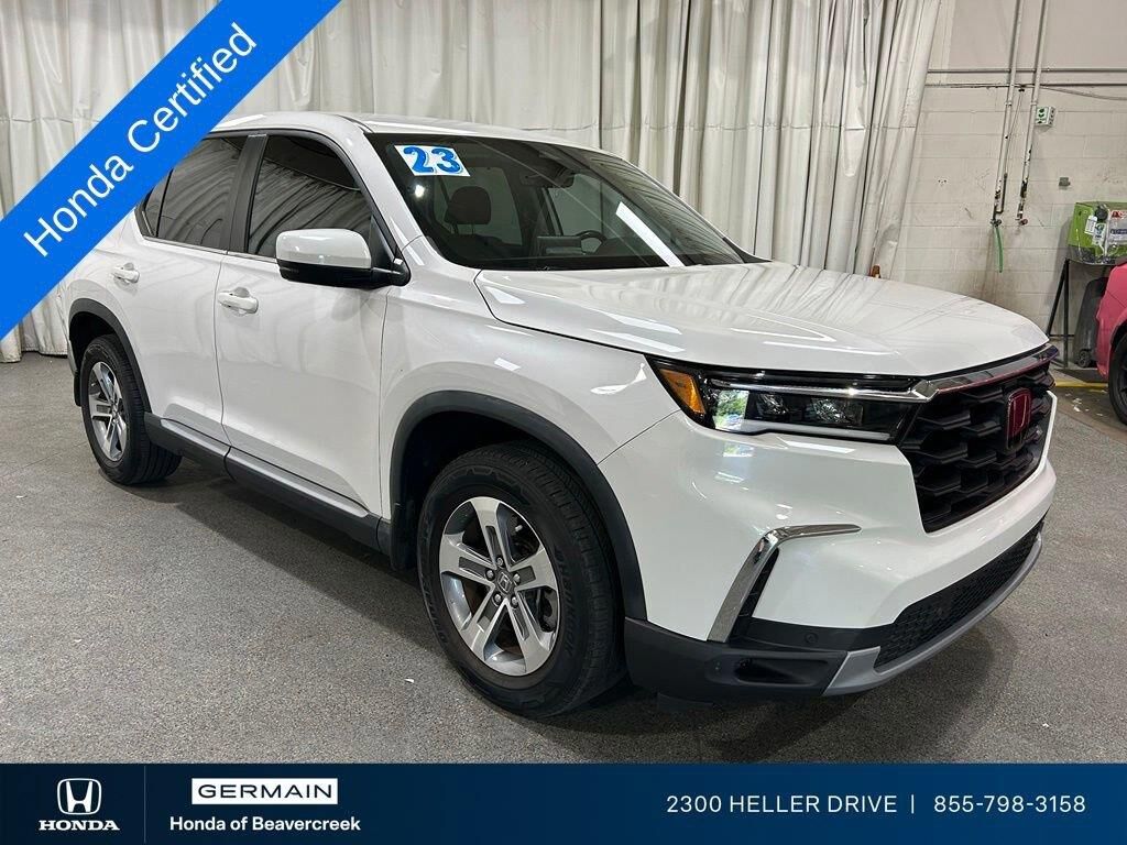 2023 Honda Pilot EX-L w/Rear Captain's Chairs — photo 1 of 7