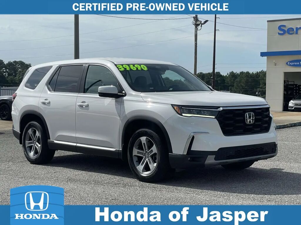 2024 Honda Pilot EX-L w/Rear Captain's Chairs — photo 1 of 14