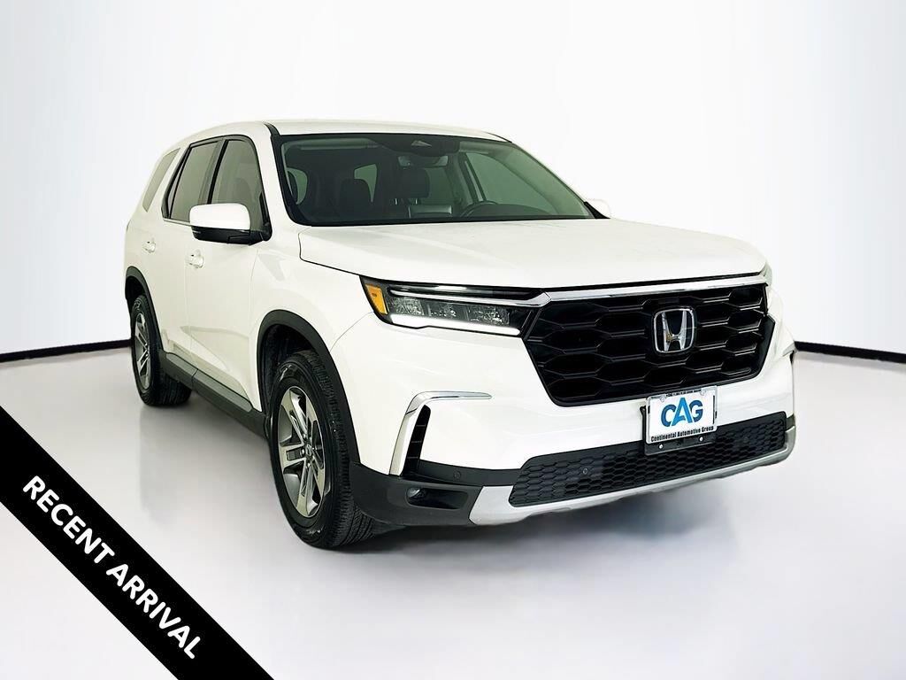2023 Honda Pilot EX-L w/Rear Captain's Chairs — photo 1 of 7
