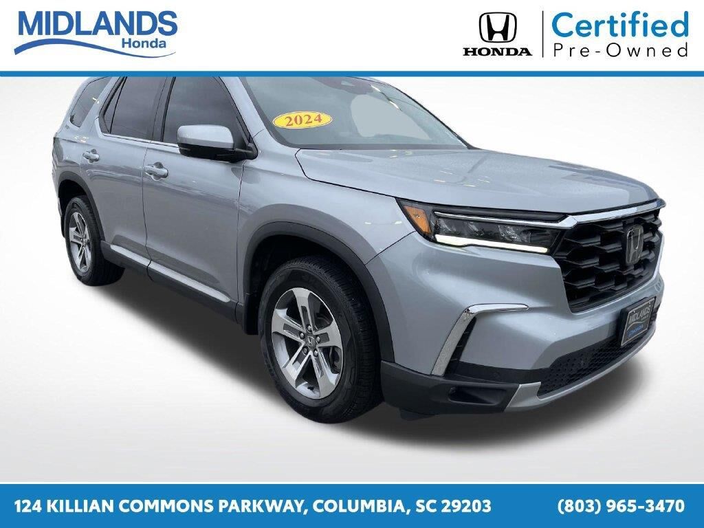 2024 Honda Pilot EX-L w/Rear Captain's Chairs — photo 1 of 13