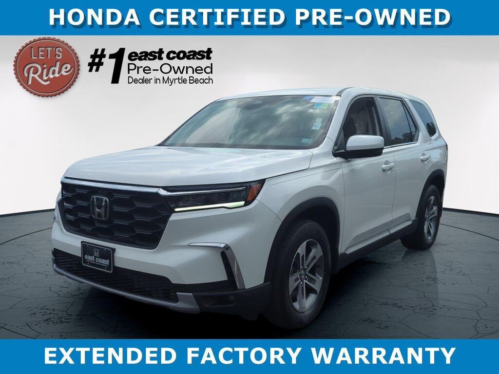2024 Honda Pilot EX-L w/Rear Captain's Chairs — photo 1 of 13