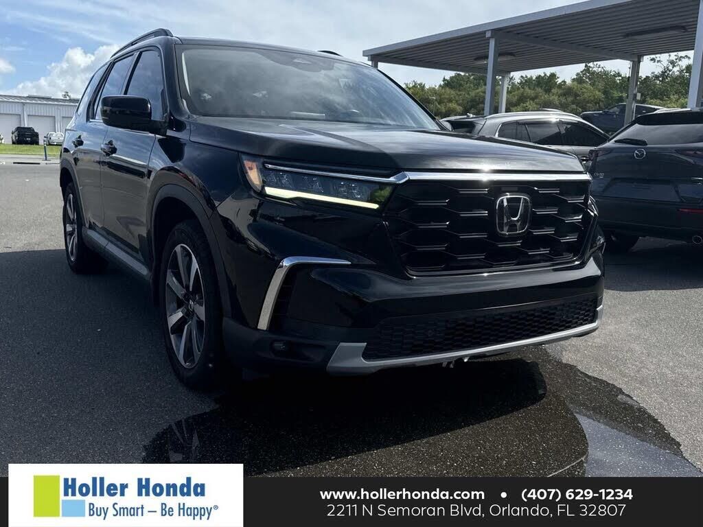 2024 Honda Pilot Touring — photo 1 of 2