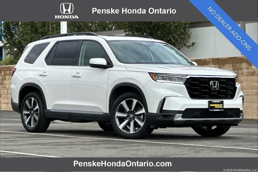 2025 Honda Pilot Touring — photo 1 of 13