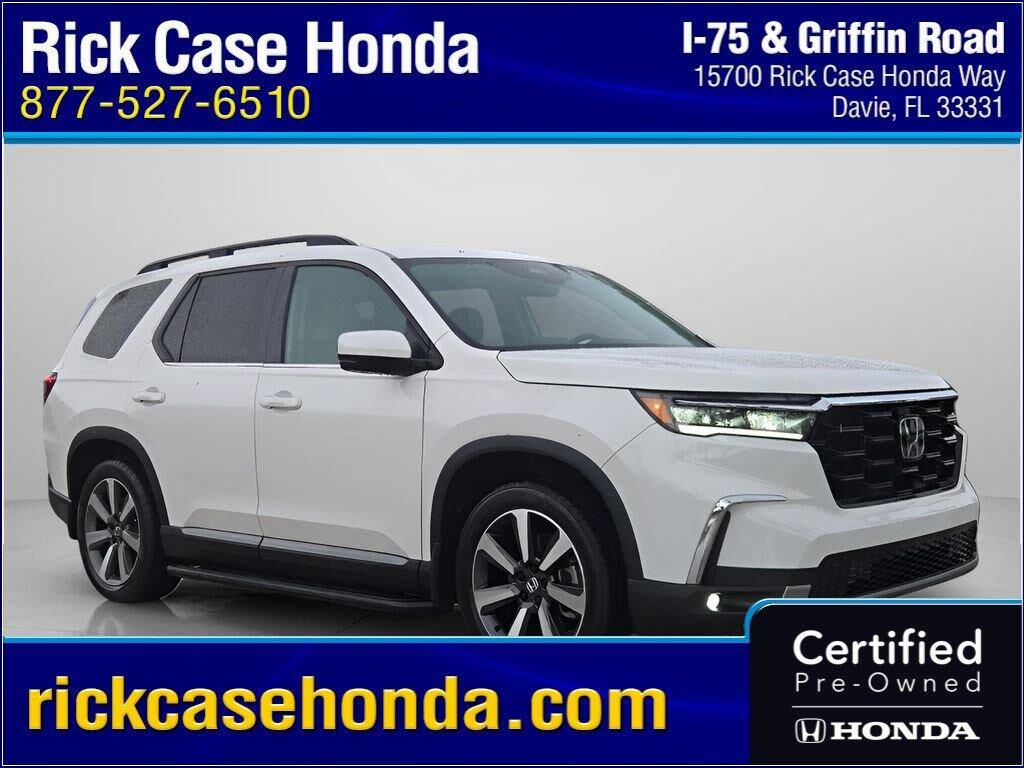 2025 Honda Pilot Touring — photo 1 of 13