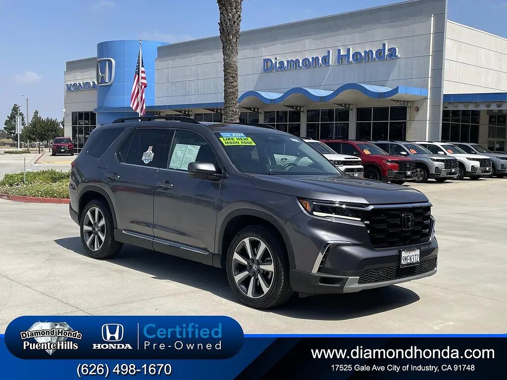 2024 Honda Pilot Touring — photo 1 of 26