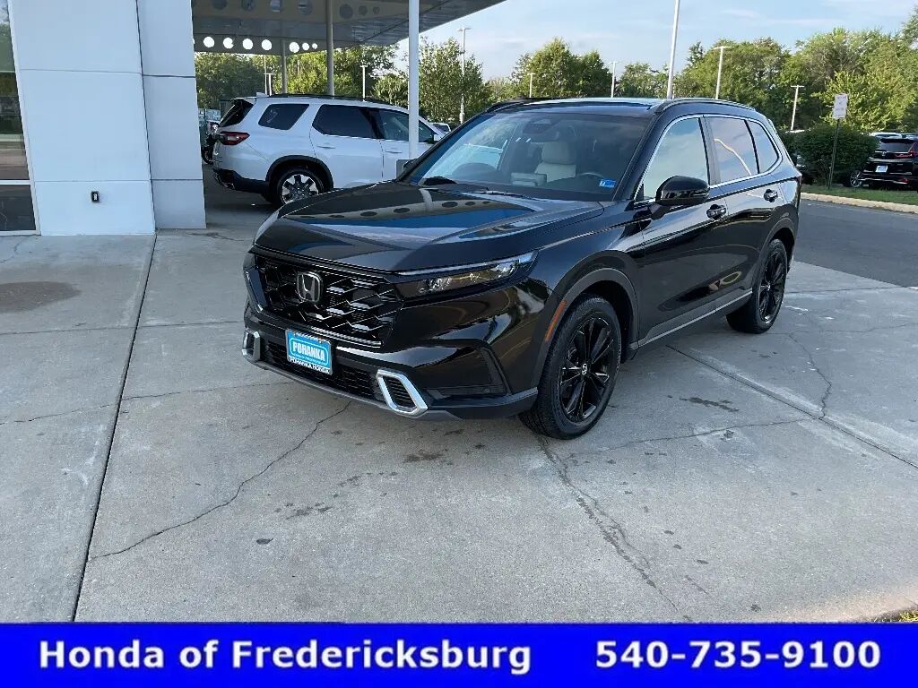 2025 Honda CR-V Hybrid Sport Touring — photo 1 of 13
