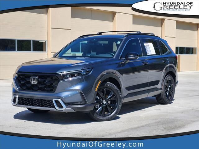 2023 Honda CR-V Hybrid Sport Touring — photo 1 of 17