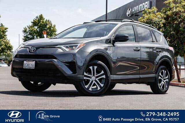 2018 Toyota RAV4 LE — photo 1 of 24
