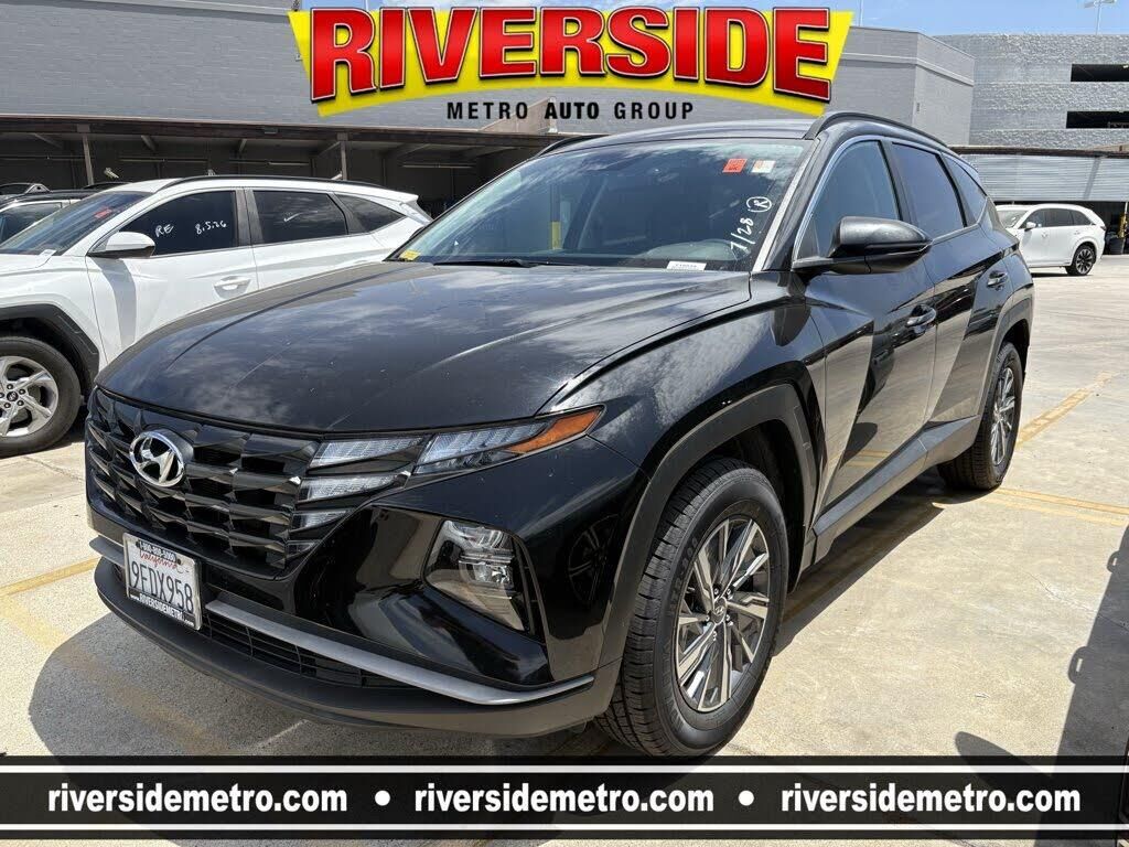 2023 Hyundai TUCSON Hybrid Blue — photo 1 of 18